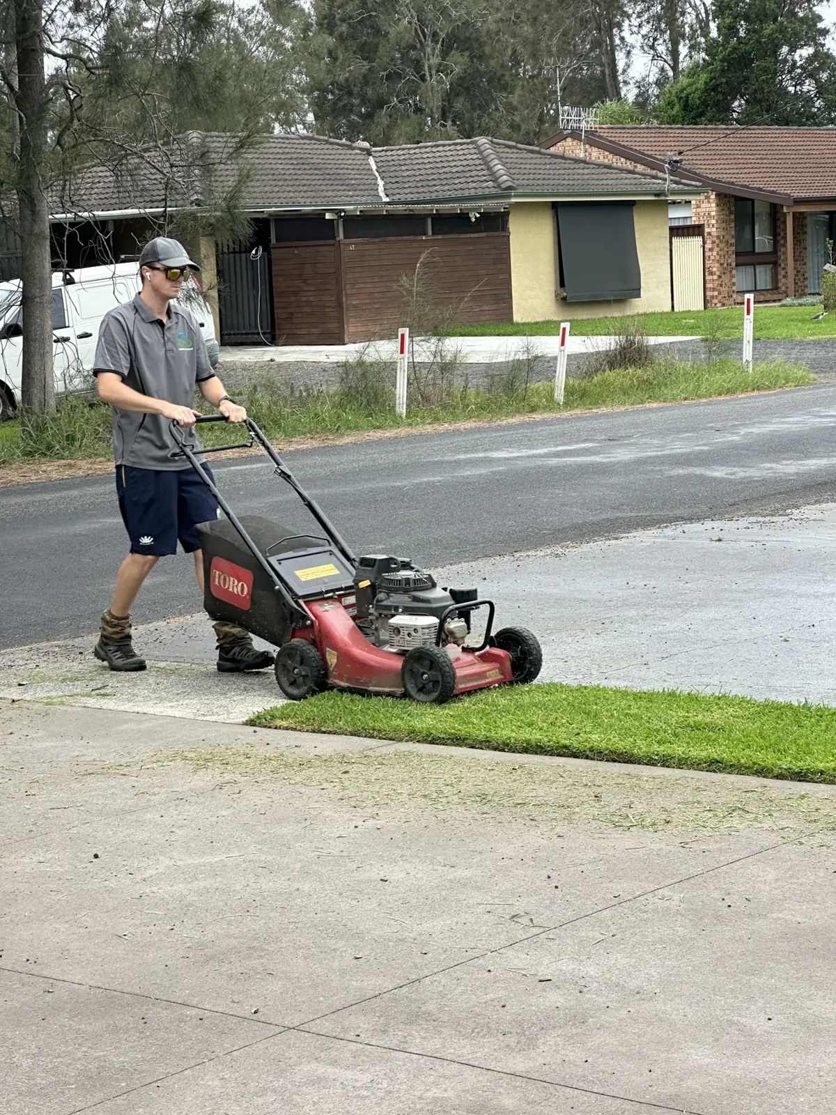 Mowing a residential nature strip